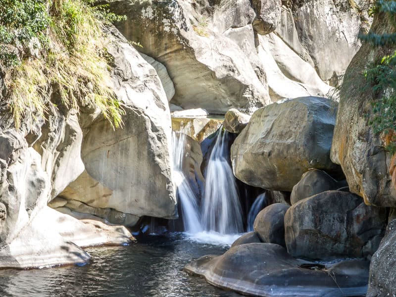 A small waterfall on a rocky creek bed