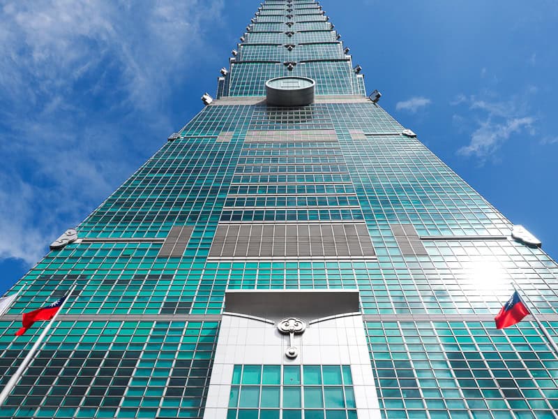 Looking up at Taipei 101 skyscraper from the bottom of it