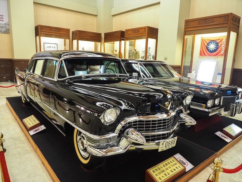 Two old cars inside the Chiang Kai Shek Memorial Hall Museum