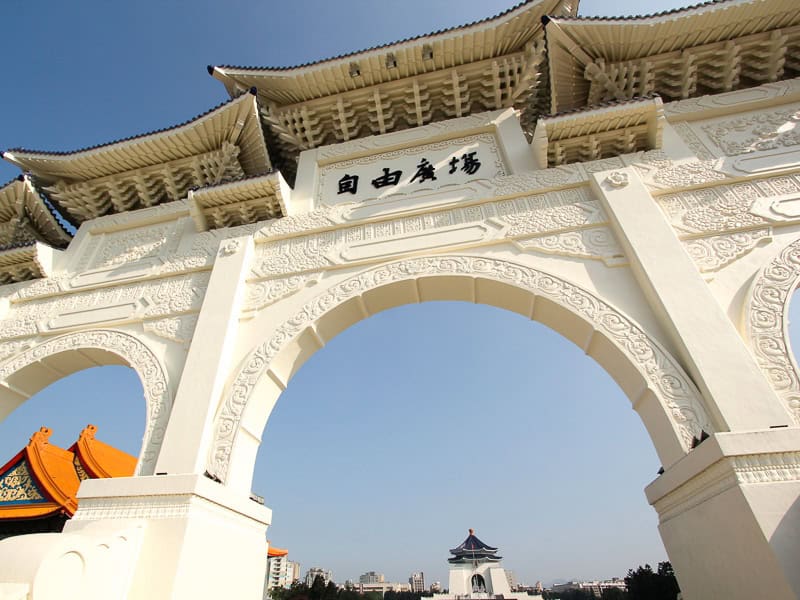 Liberty Square Arch shot from a slight angle, with CKS Memorial Hall visible in the distance through the main arch