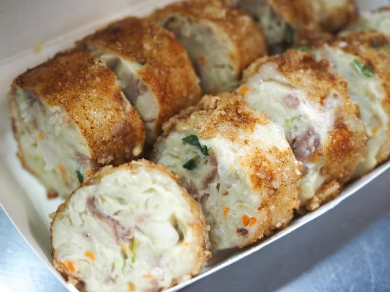 Close up of a famous meat roll from Chiayi market, cut into round bite-sized pieces
