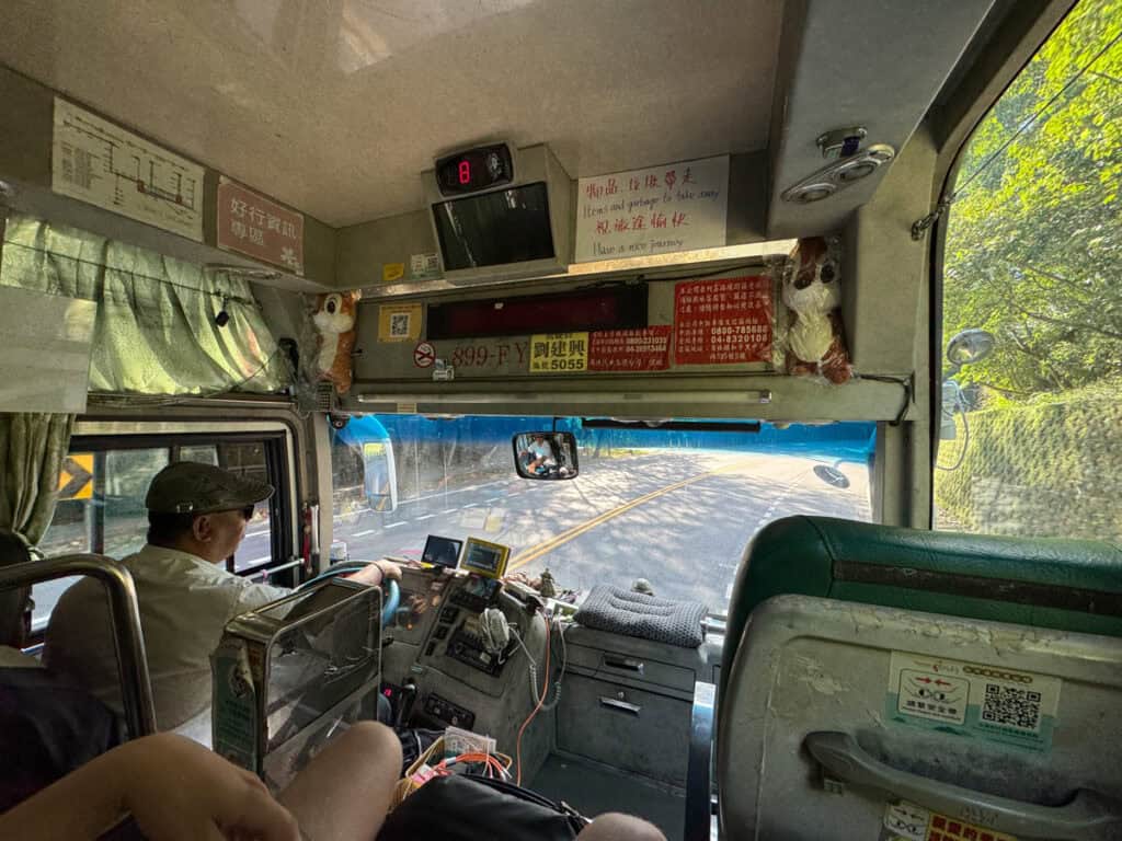 View of the driver and front of the Sun Moon Lake to Alishan bus shot from one of the front seats on the bus