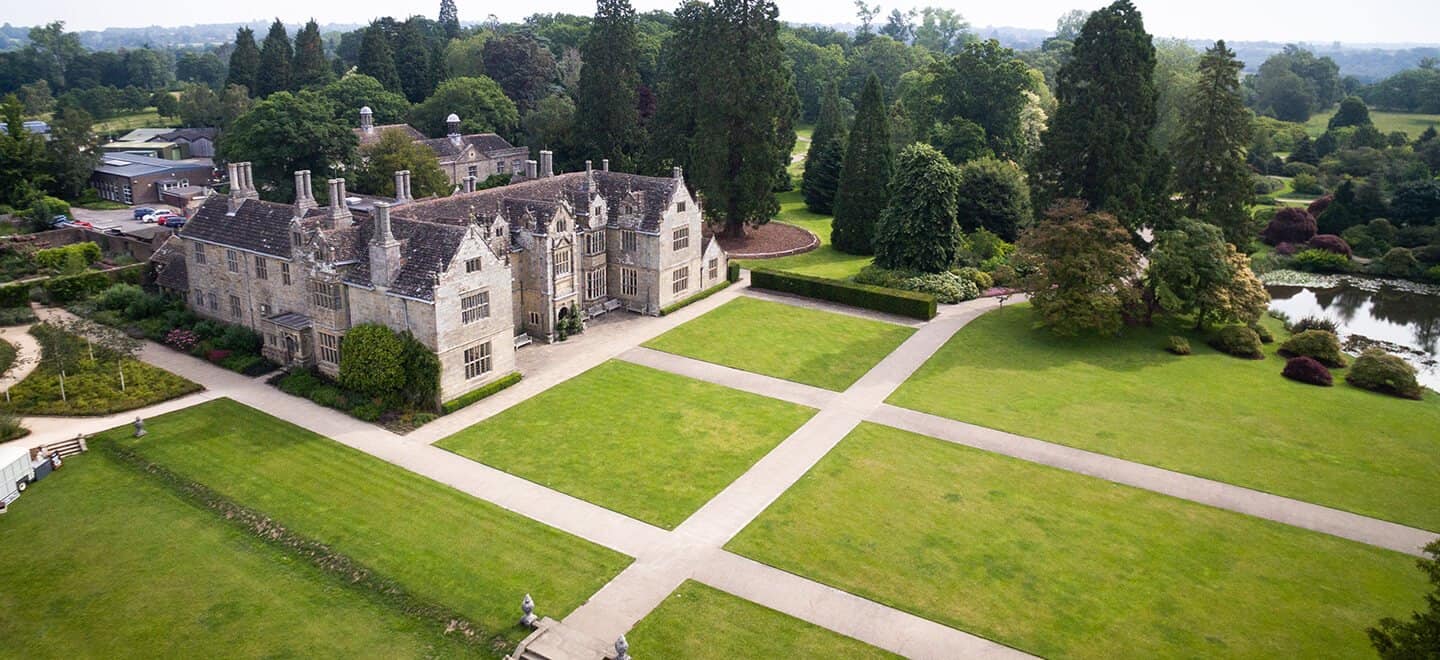Aerial View Of Manshion At Wakehurst Gay Wedding Venue West Sussex Via Gay Wedding Guide 1440X660 1 1