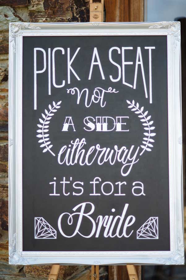 Pick A Seat Not A Side Sign At Lesbian Wedding Of Emma And Amy At Ocean Kave Image By Margorphotography 1 5