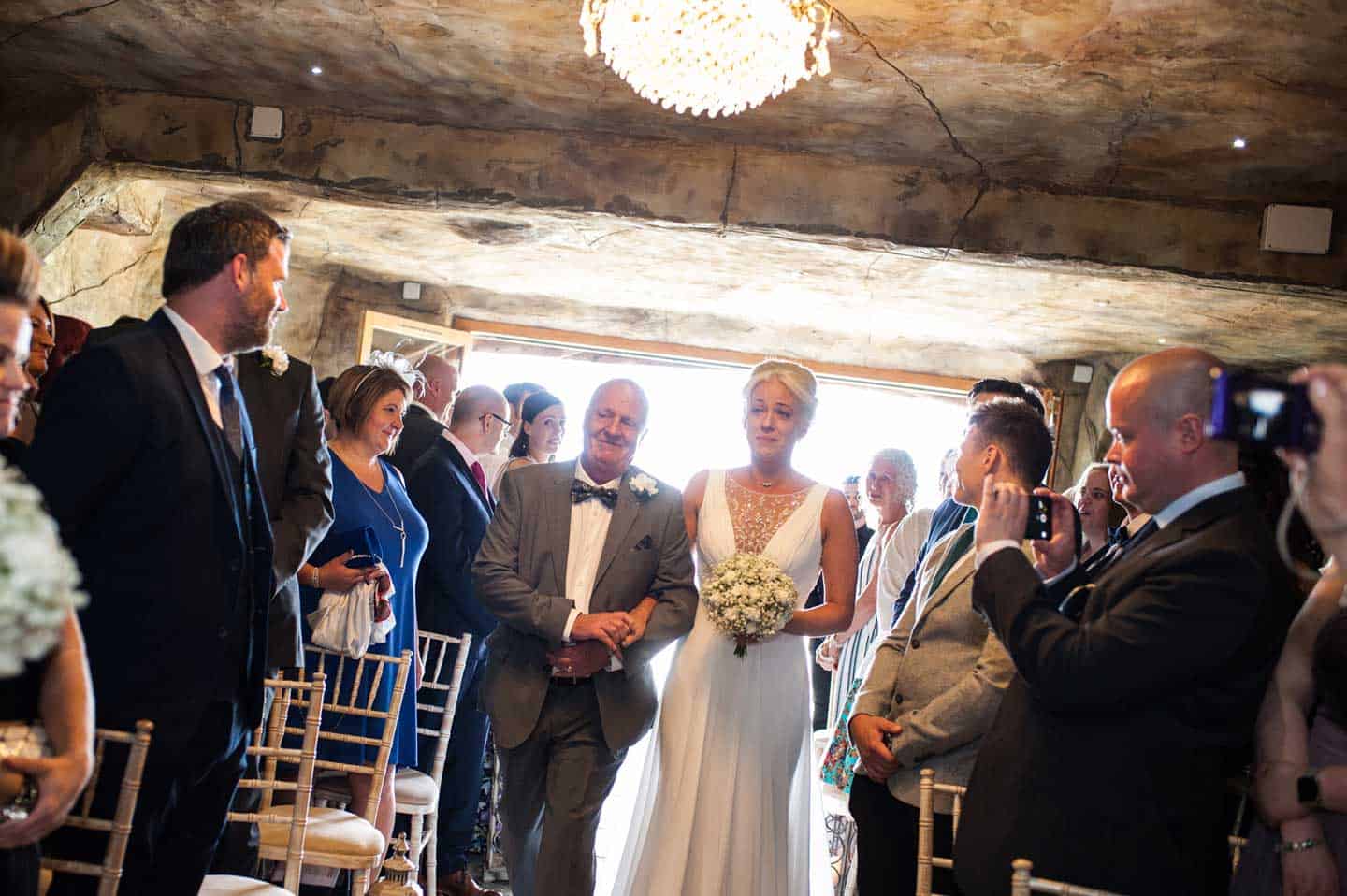 Walking The Aisle At Lesbian Wedding Of Emma And Amy At Ocean Kave Image By Margorphotography 1 5