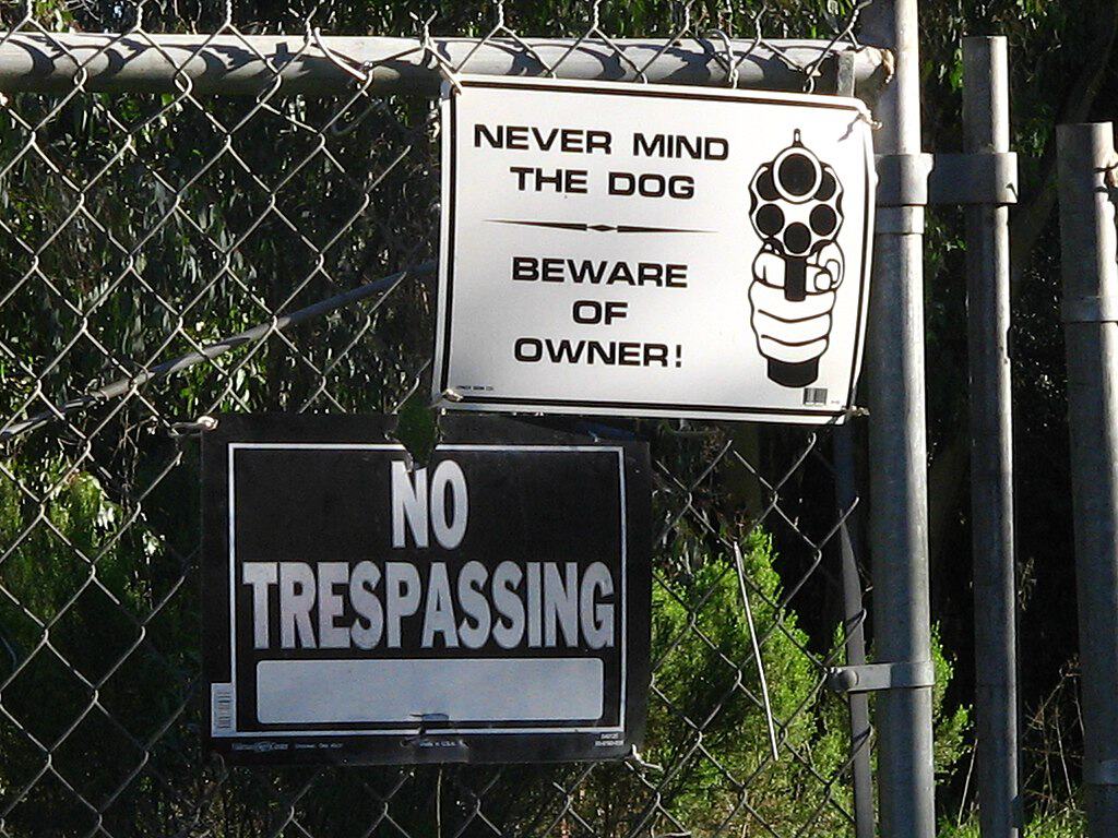Never Mind the Dog, Beware Of Owner Sign. Vigilantism.
