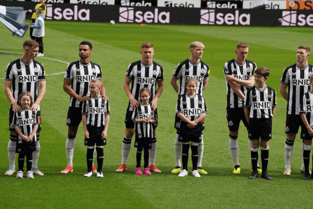 The newcastle united shirts in action on match day.