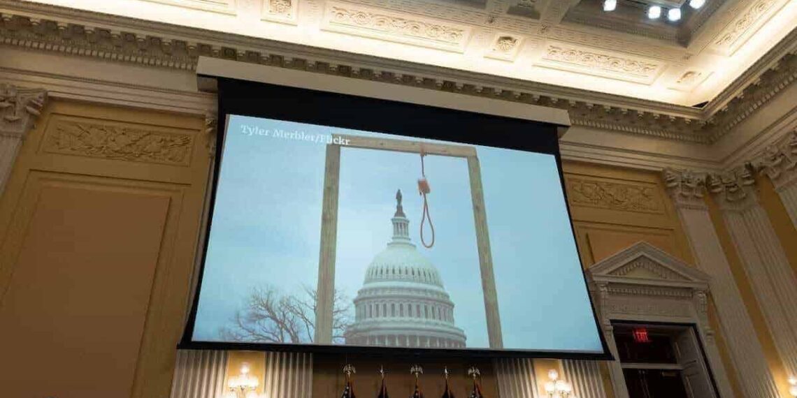 Projector at the january 6th hearings showing the gallows that was erected outside the capitol that day