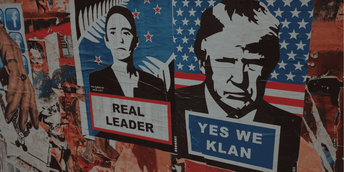 Posters and graffiti on a building in mexico. Posters feature mexican and u. S. Leaders. Mexican president’s poster says real leader. Donald trump poster sats yes we klan