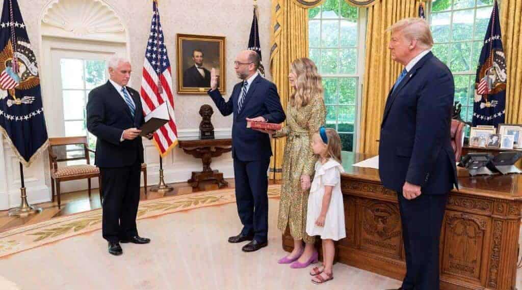 Russell vought being sworn in during the first trump administration