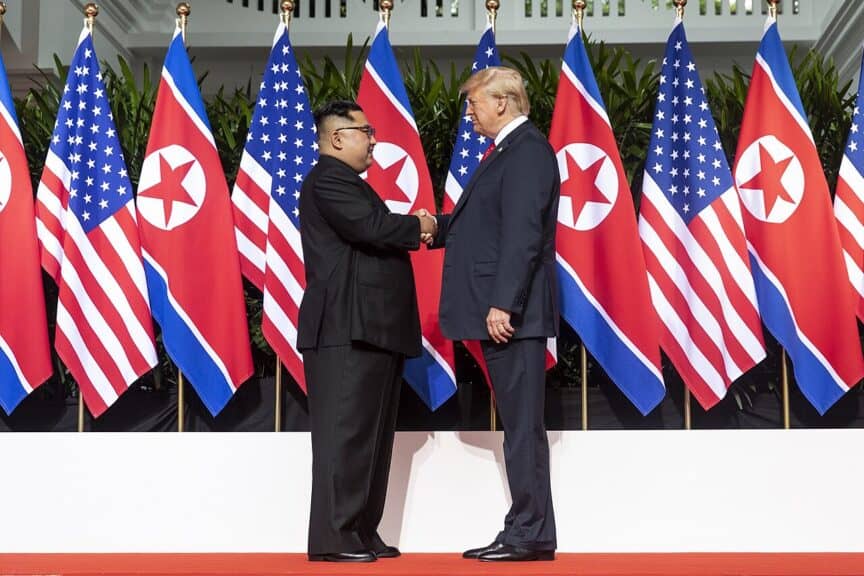 Democracy is being destroyed. Trump shakes hand of the leader of north korea during a visit during his first term.