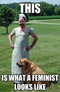 John Scalzi in a mint green Regency dress, with a dog on the lawn.