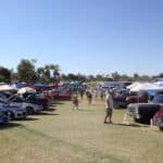 Spectators walking between rows of classic cars at Relics and Rods Run to the Sun in Lake Havasu City