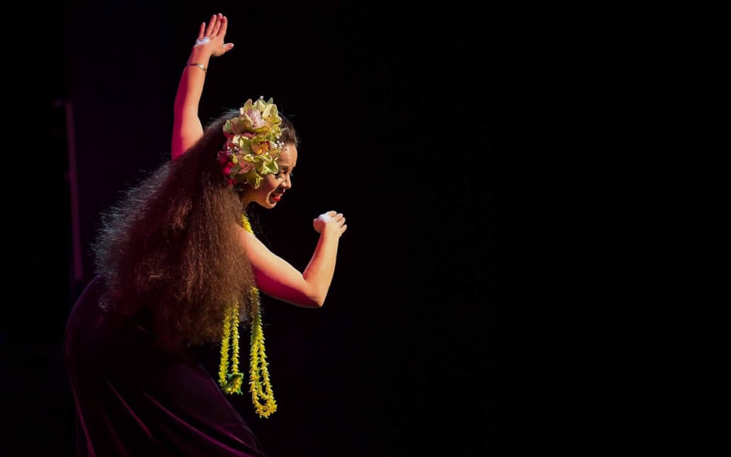 Image of Edie Stanley performing Hawaiian dance on stage
