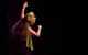Image of Edie Stanley performing Hawaiian dance on stage