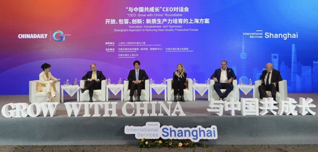 Foreign business leaders and experts speak at the "Grow with China" CEO roundtable