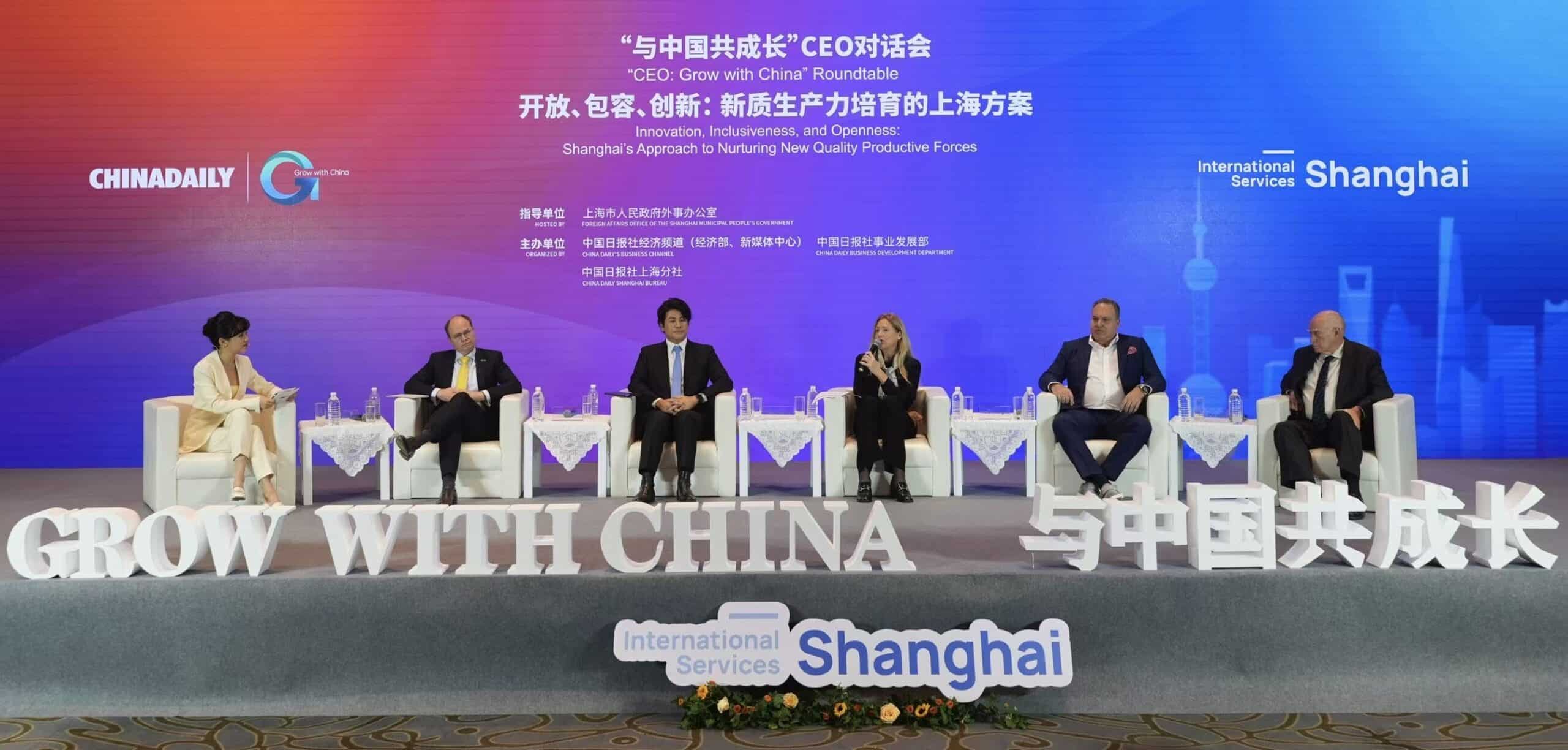 Foreign business leaders and experts speak at the "Grow with China" CEO roundtable