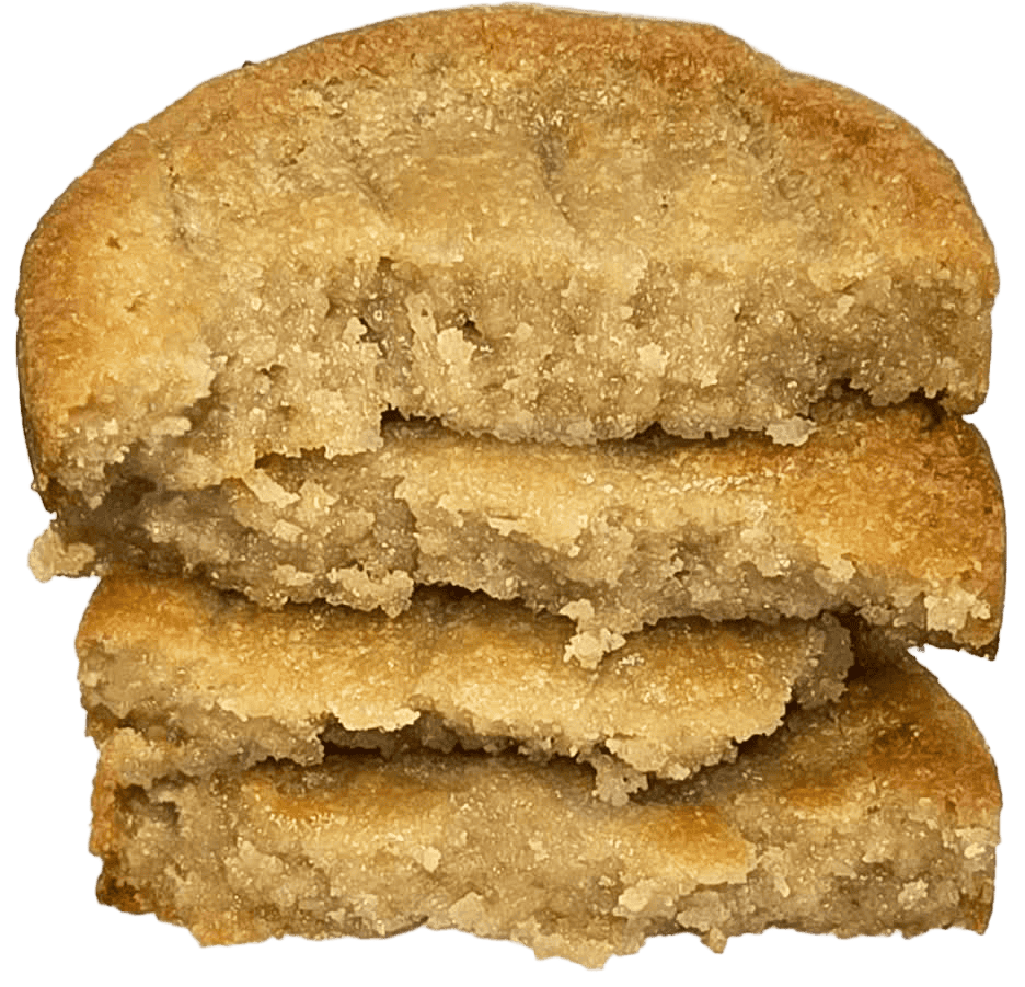 Stack of four thick golden cookies that are cut in half showing their soft and chewy middles