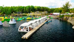 Beautiful dock surrounded by trees and inflatables