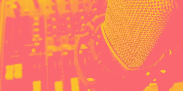colourised photo of a podcast microphone