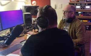 Podcast Producer, Martin Franklin working with a client in East Coast Studio