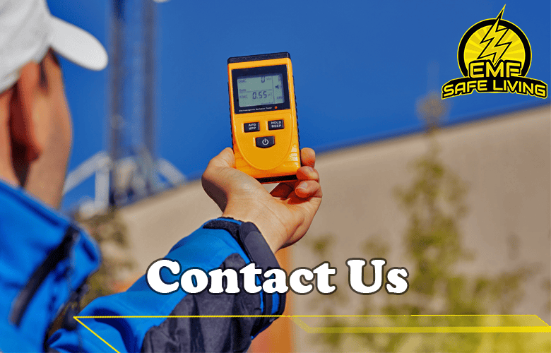 A man holding up a digital thermometer prominently displaying the words Contact Us.