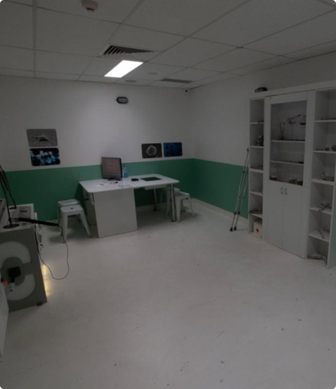A room with white walls and green walls.