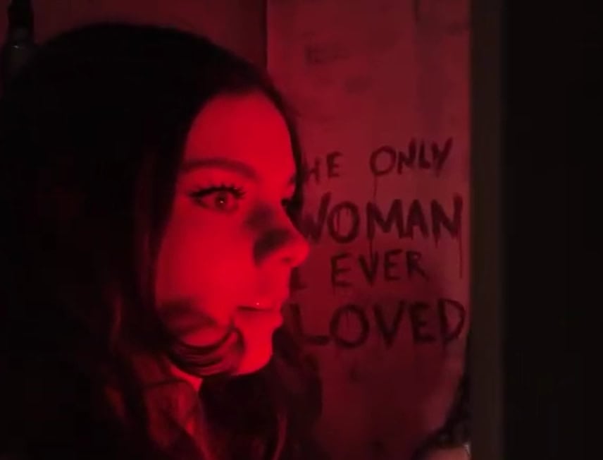 Close up of womans face in the Zodiac Killer room