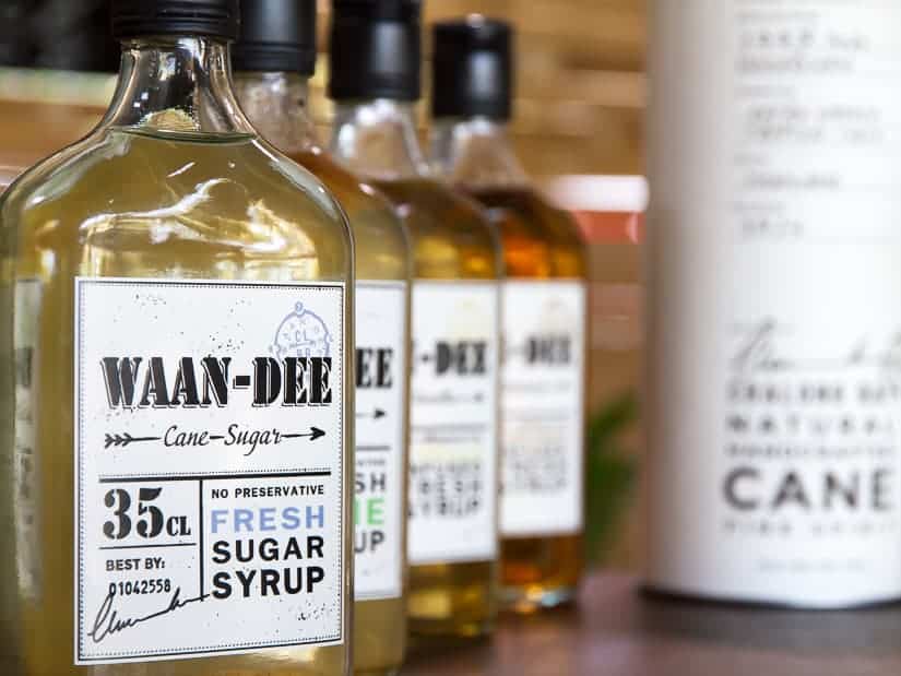 Bottles of rum and cane sugar syrup
