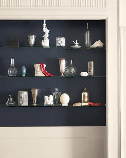 Mysterious-Shelving-413x520 white wall with dark blue shelving