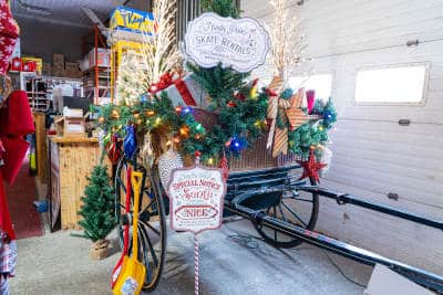 christmas decorations in old fashioned cart