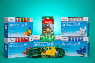 packages of christmas lights and an electric extension cord