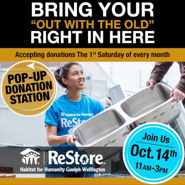 lady representative of habitat for humanity receiving kitchen sink donation