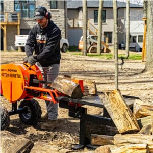 man operating the dk2 ops240 log splitter
