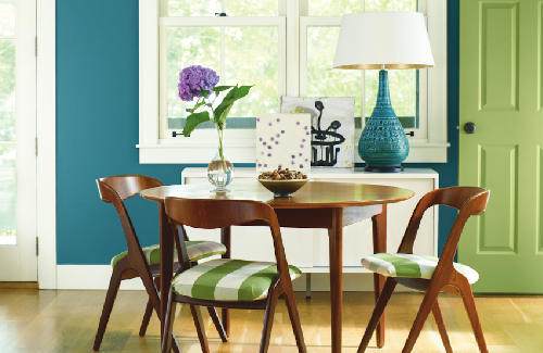 ben-kitchen-table round dining room table and chairs in front of walls painted with benjamin moore ben paint