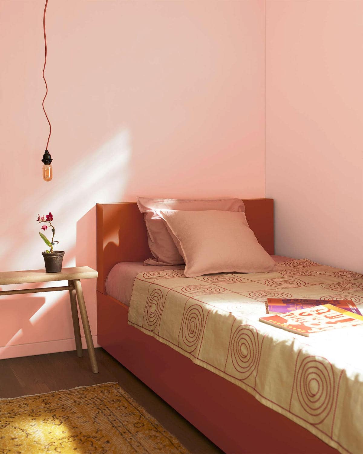 teacup-rose-painted-bedroom-walls bedroom with single bed and walls painted with benjamin moore's teacup rose colour