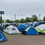 how to report a homeless person