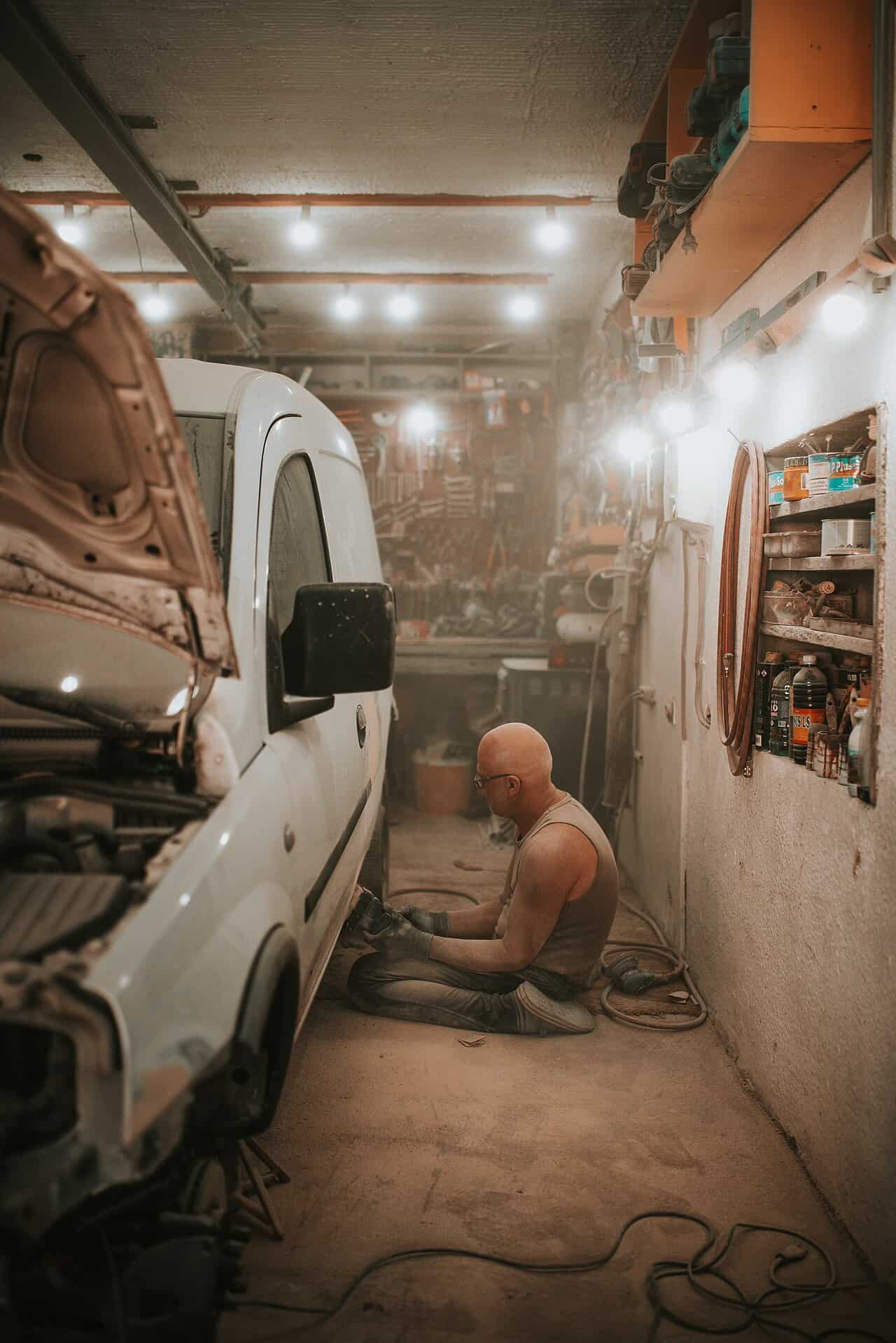 Vehicle owner reviewing written repair estimate and disputed itemized labor charges
