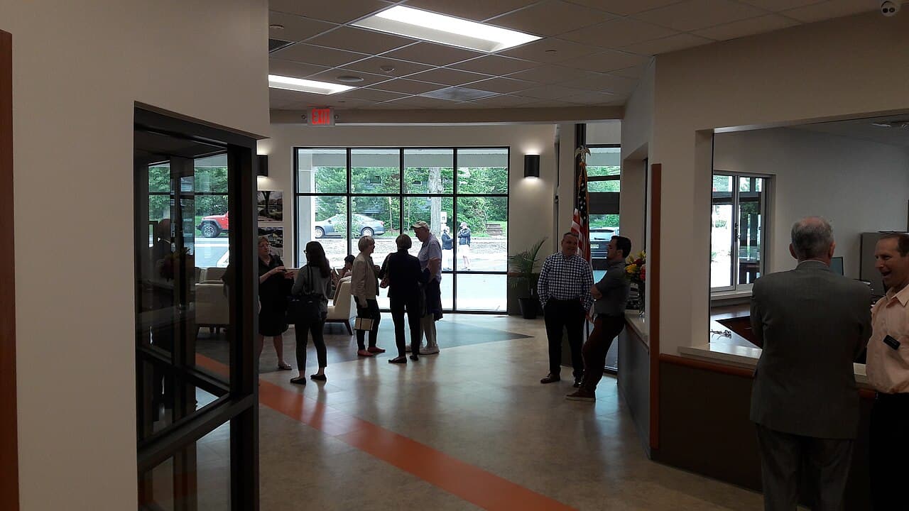 Municipal homeless shelter intake facility coordinating emergency shelter beds