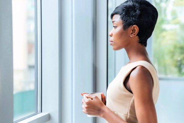 Woman looking out of window