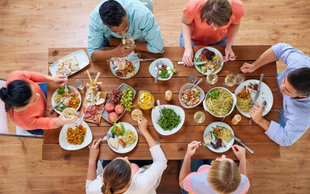 Group of friends eating slowly