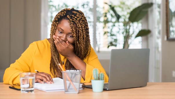 Woman writing SMART goals