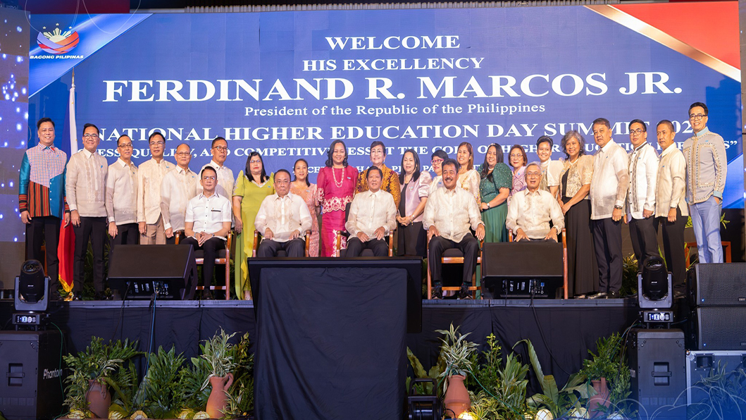 LCCian Presents Winning Artwork to  President Marcos at CHED Summit