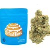 Sealed package of Berner Cookies Sticky Buns cannabis strain with Moonrock Online Shop logo