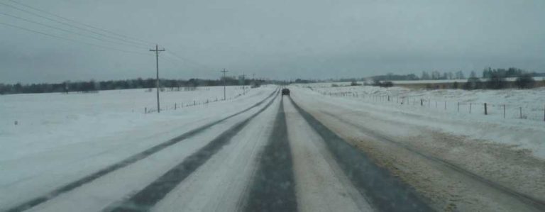 rural orangeville area snow covered road