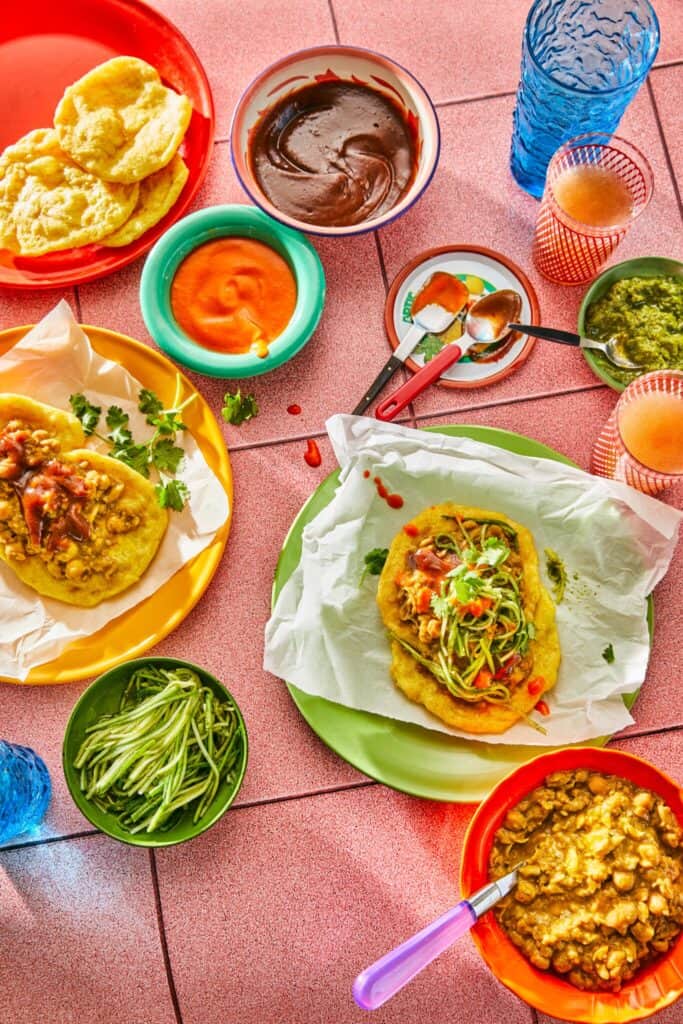Photo of a table full of Indo-Guyanese cuisine.