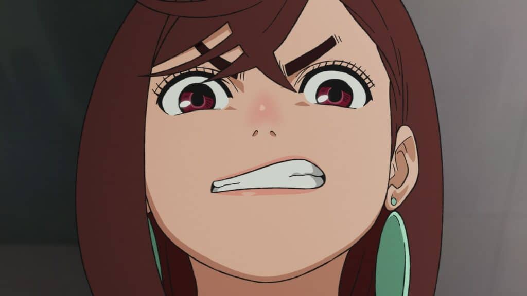 Still frame from "Dan Da Dan." A woman looks determined.