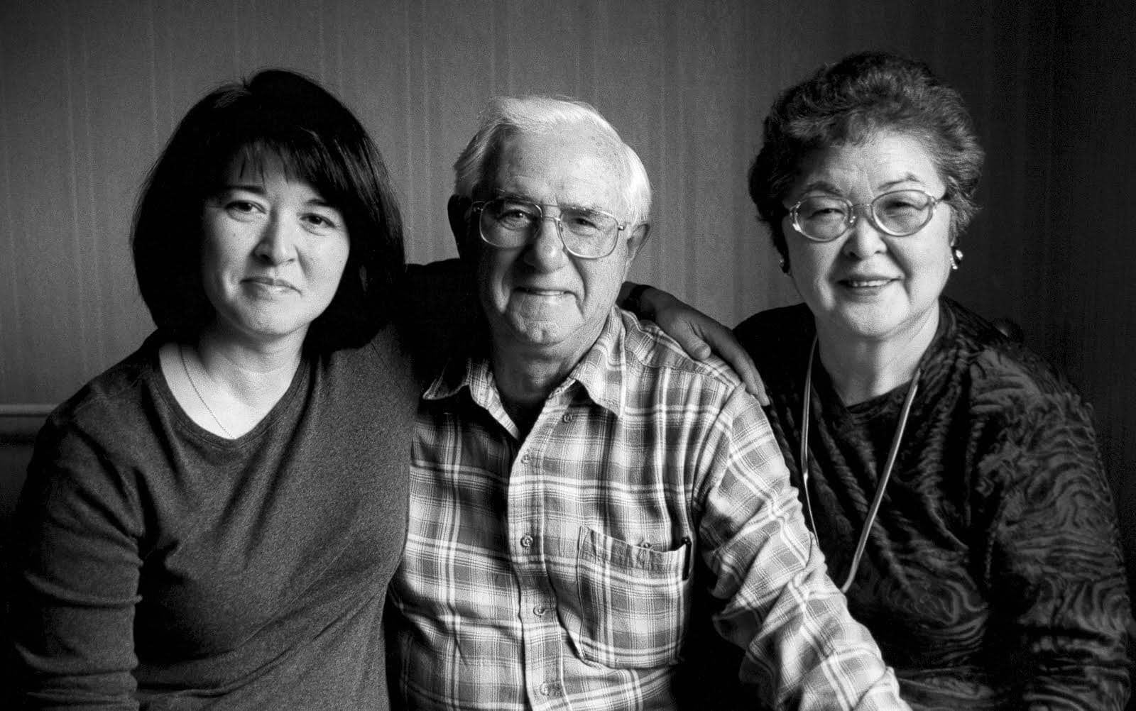 Black-and-white photos of the Kasmauski family.