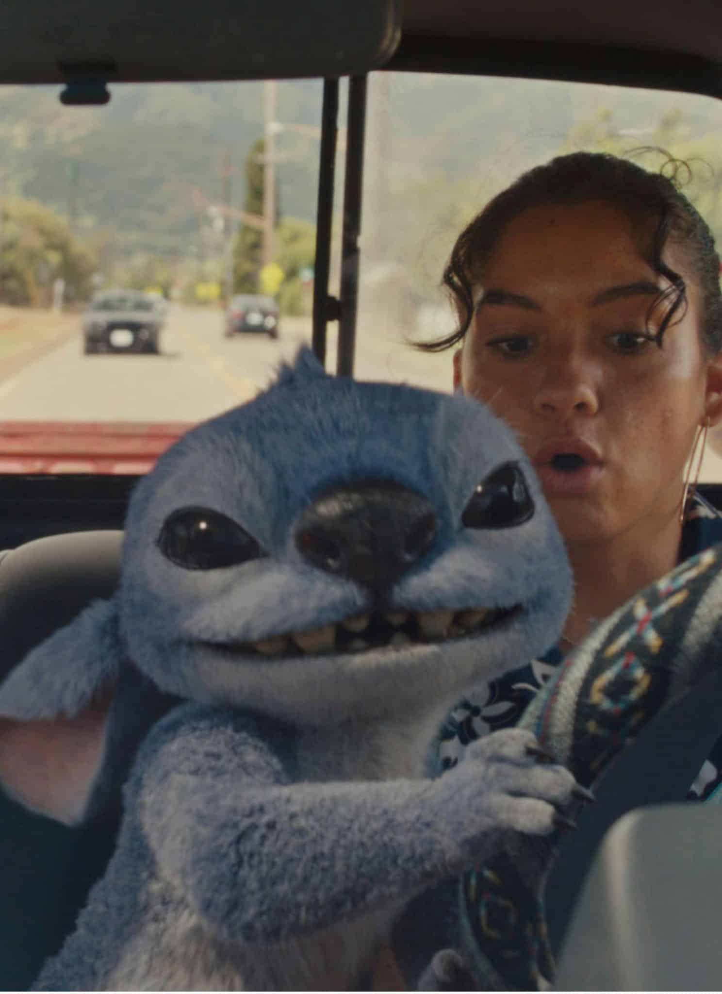 Maia Kealoha and Sydney Elizebeth Agudong in car with CGI Stitch.