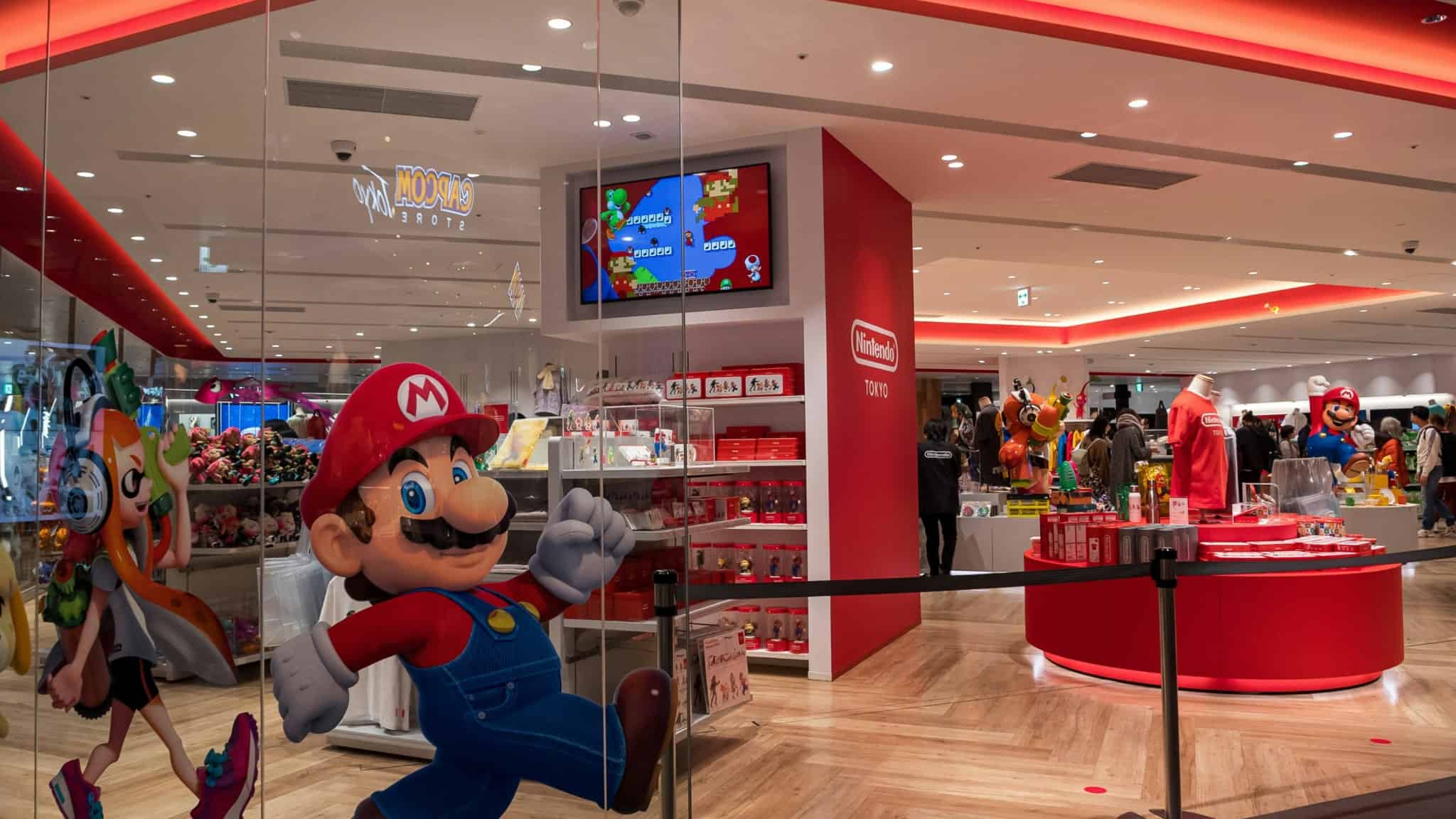 Nintendo store with Mario sticker out front and lots of red displays.